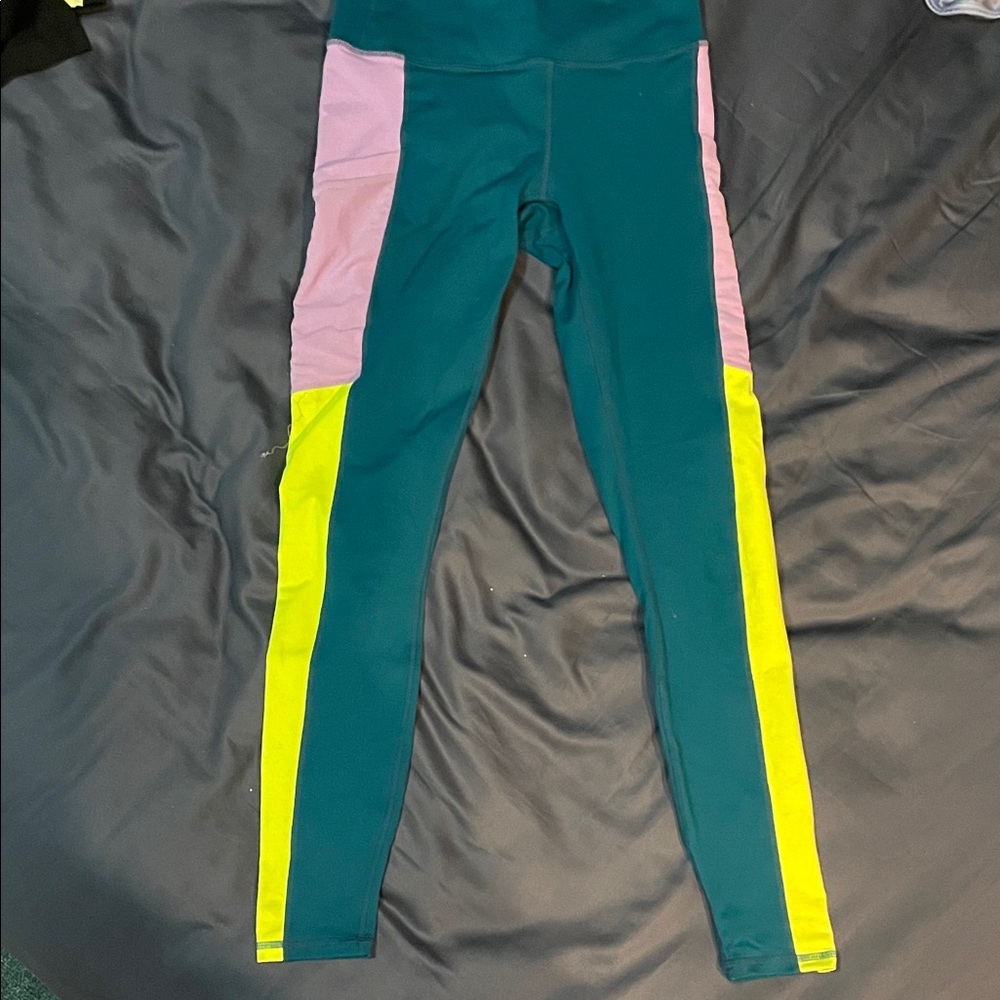 Fabletics Leggings in Teal, lavender , and neon Yellow